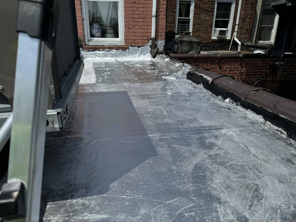 Slide of J&M Roofing