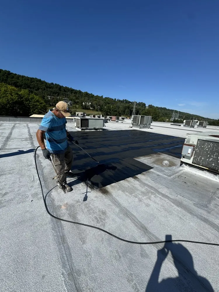 Slide of J&M Roofing