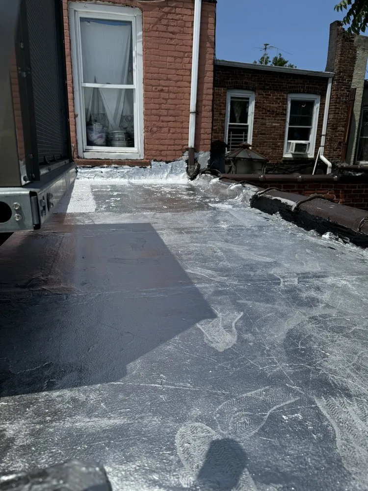 Slide of J&M Roofing