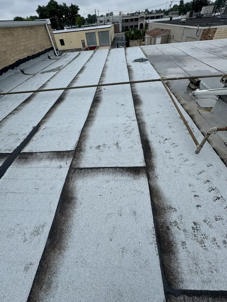 Slide of J&M Roofing