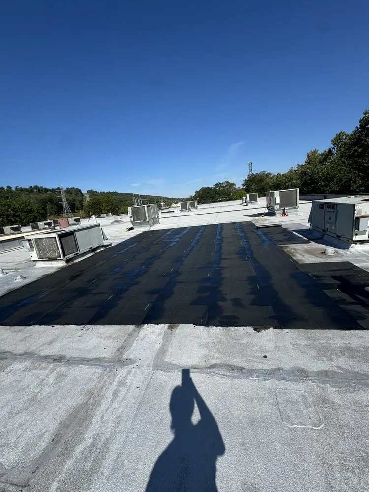 Slide of J&M Roofing