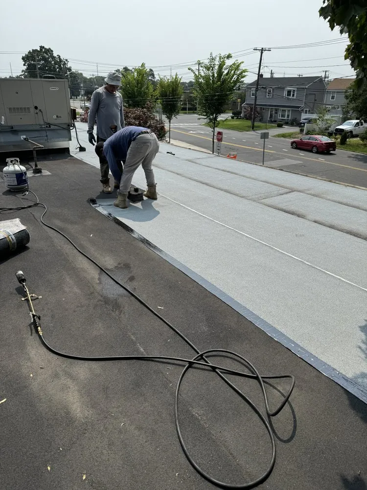 Slide of J&M Roofing