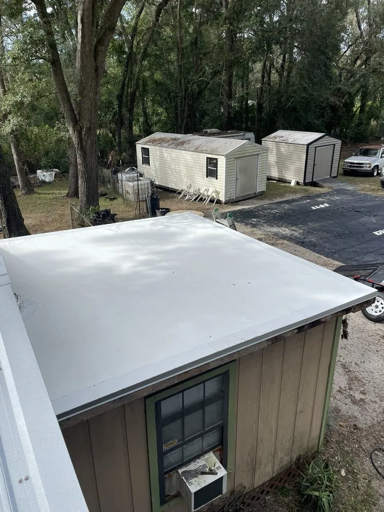 Expert flat roof repair after storm damage in Pomona Park, FL by JM Roofing