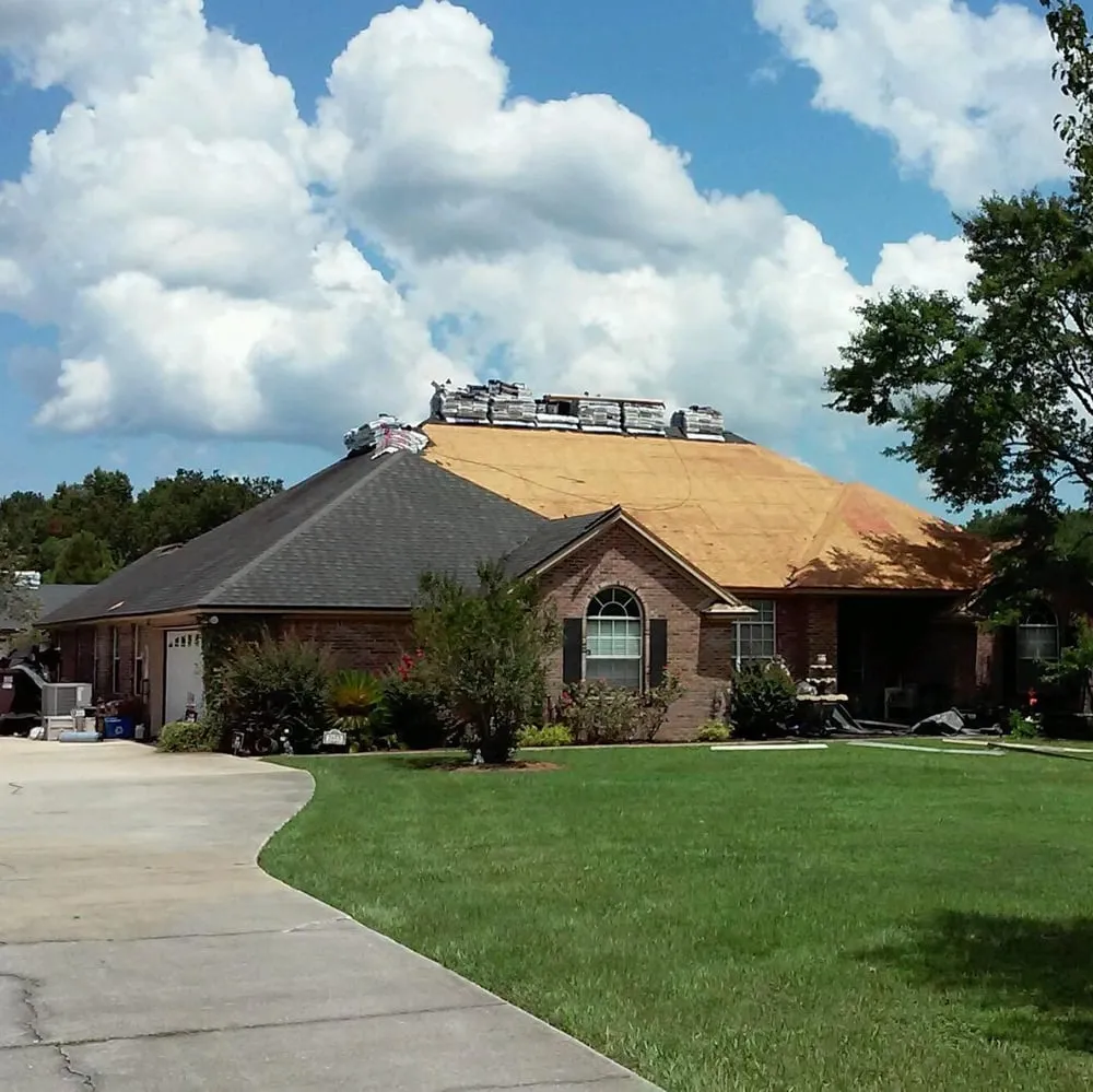 Slide of J&M Roofing Services