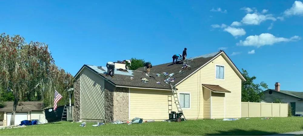 Slide of J&M Roofing Services