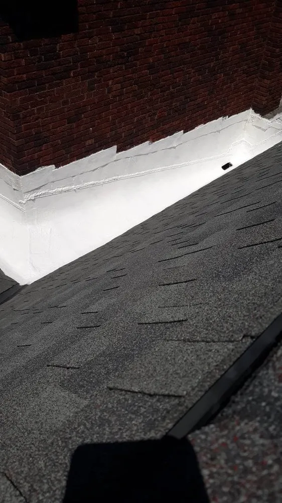 Slide of JM Roofing Solutions