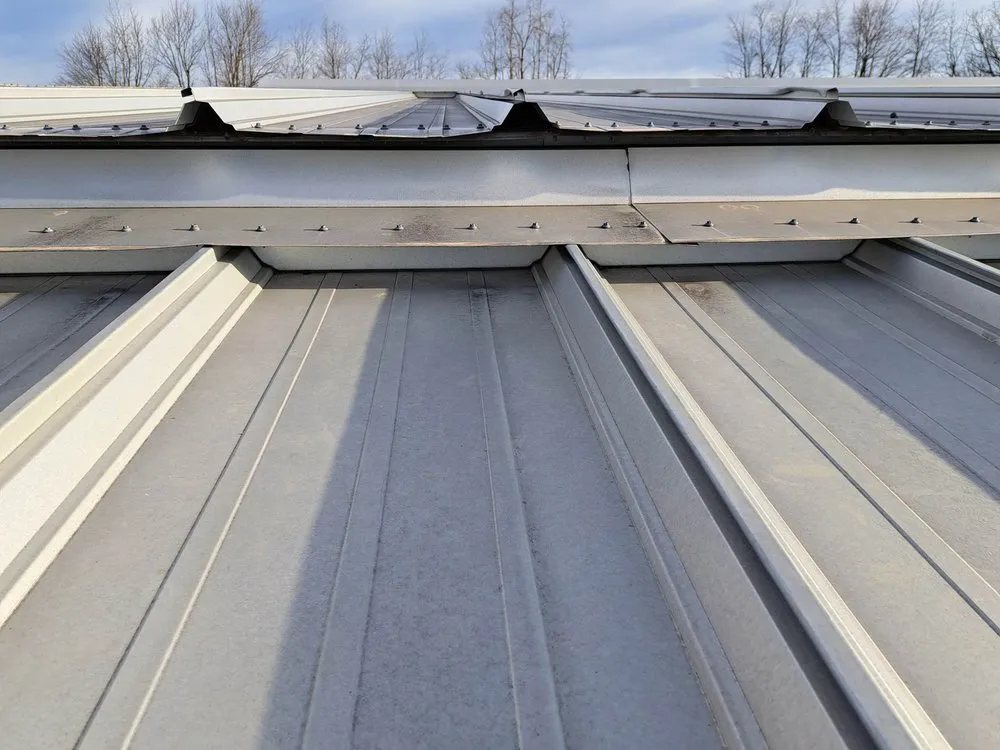 Slide of JM Roofing Solutions