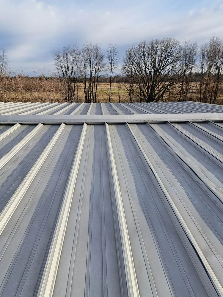 Slide of JM Roofing Solutions