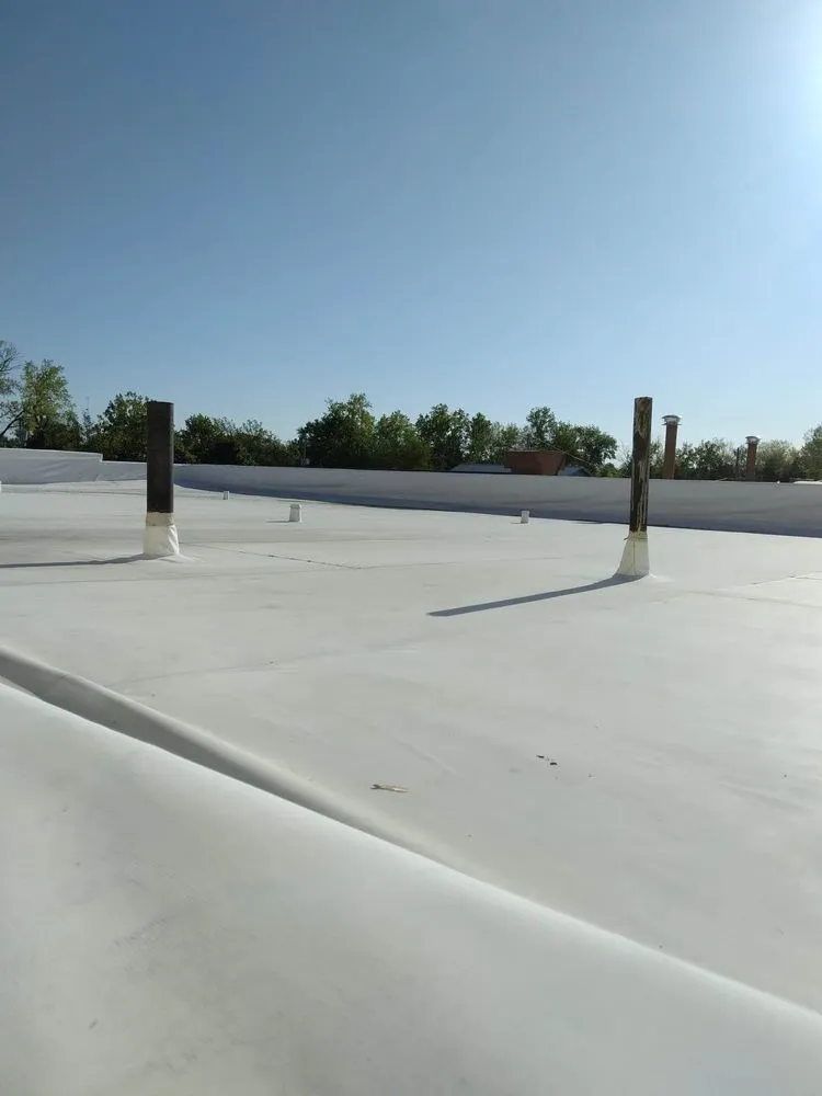 Slide of JM Roofing Solutions