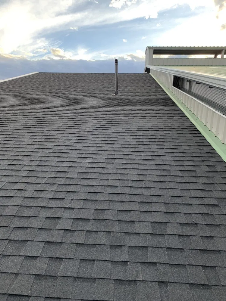 Slide of JM Roofing Solutions