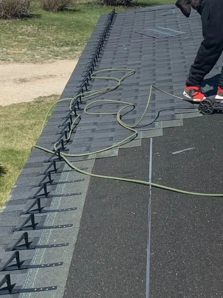 Slide of JM Roofing Solutions