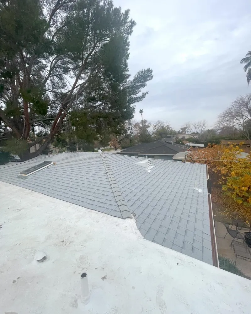 Slide of JM Roofing Solutions