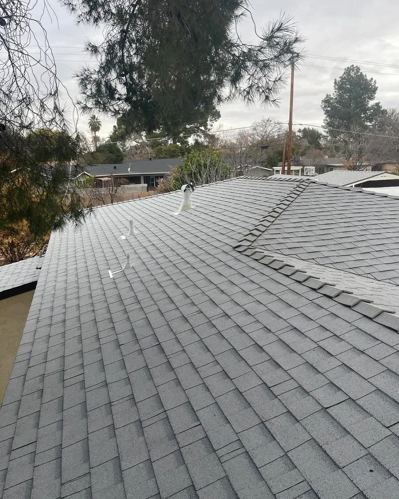 Slide of JM Roofing Solutions