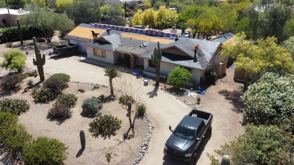 Slide of JM Roofing Solutions