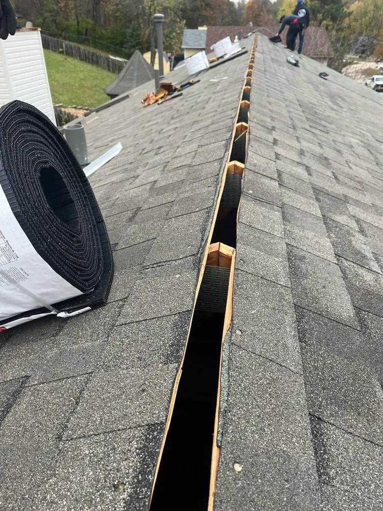 Slide of JM Roofing Solutions