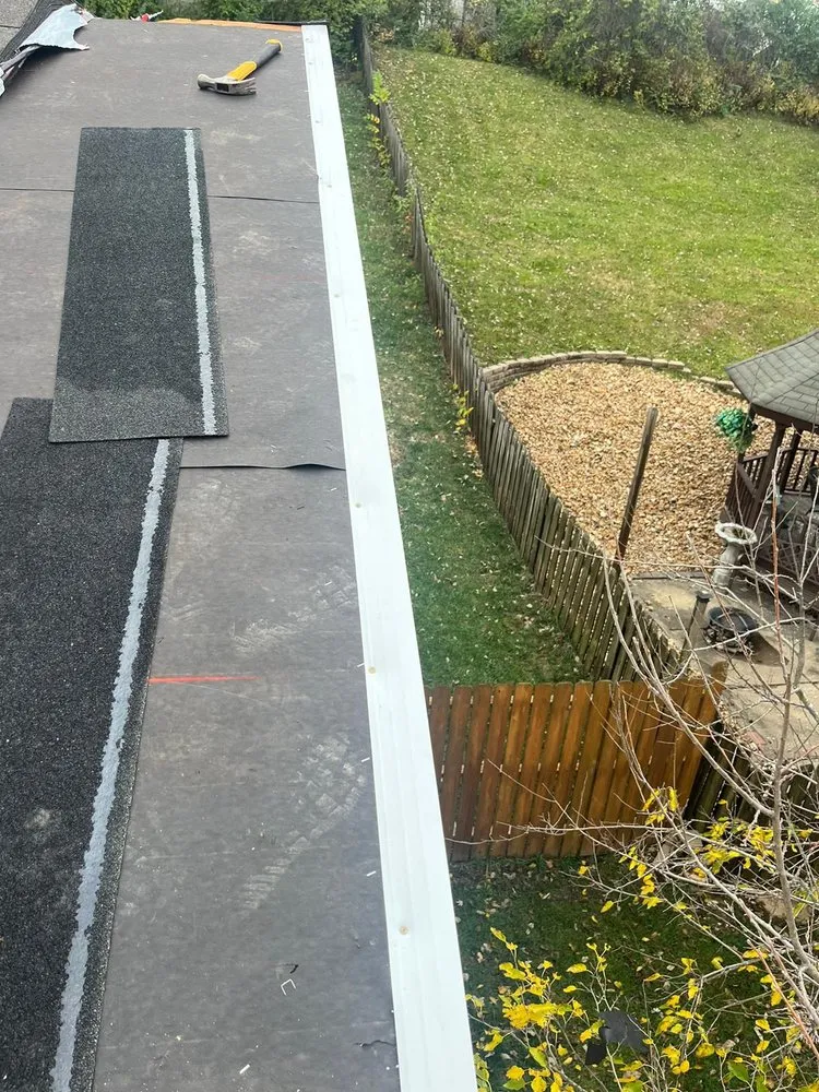 Slide of JM Roofing Solutions