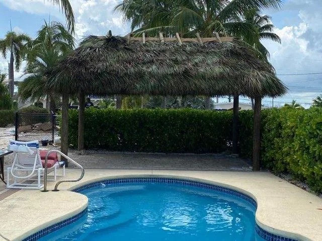 Slide of JM Tiki huts