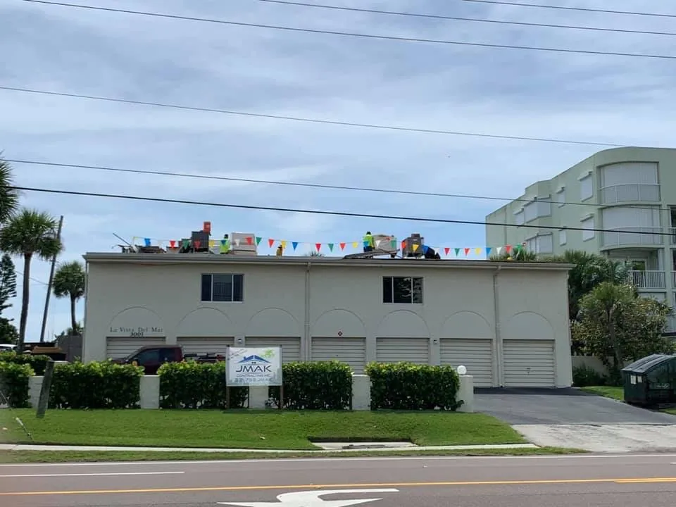 Slide of JMAK Roofing