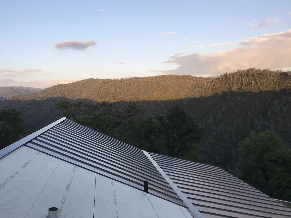 Slide of JMK Roofing