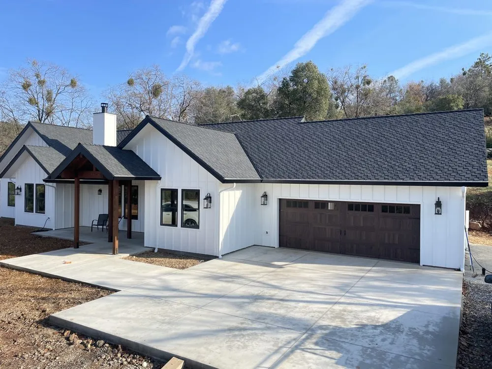 Slide of JMK Roofing