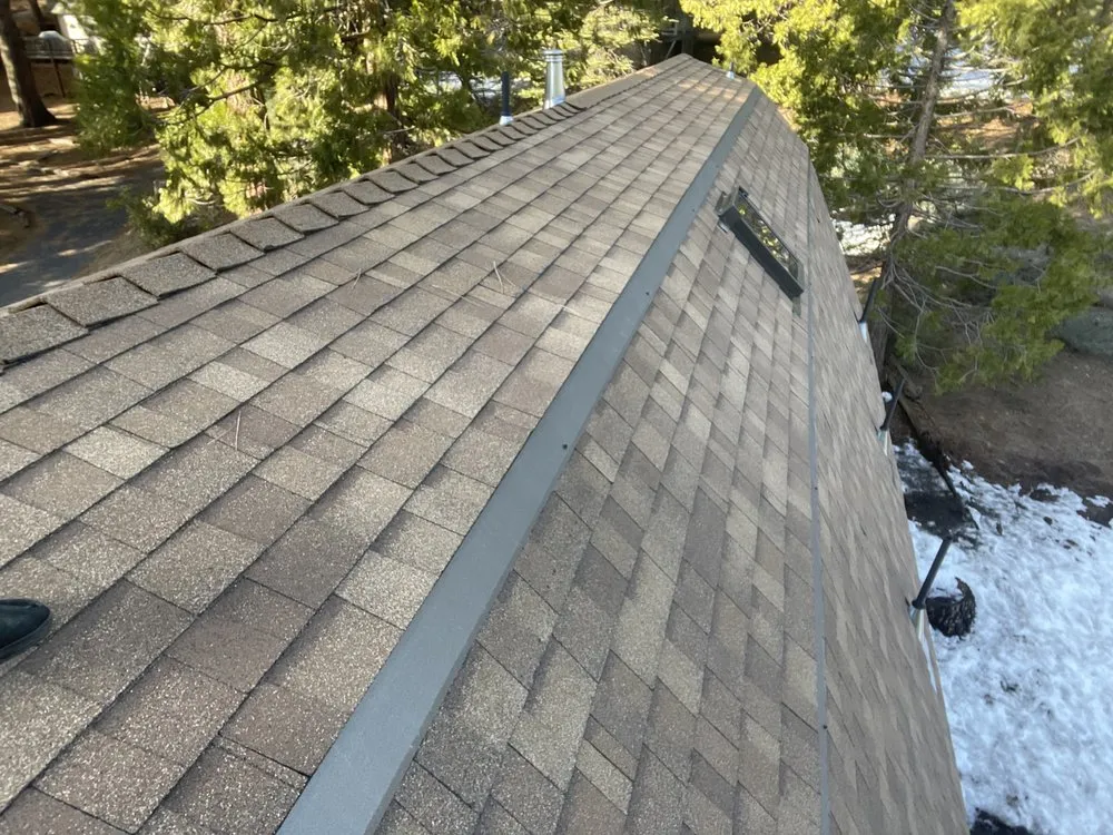 Slide of JMK Roofing