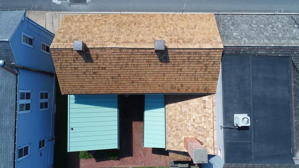 Slide of JMK Roofing