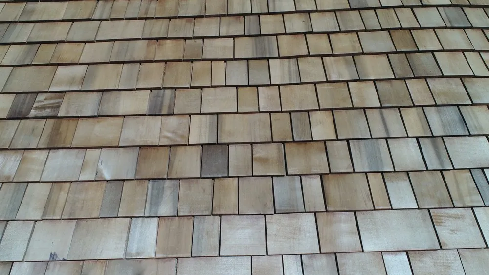 Slide of JMK Roofing