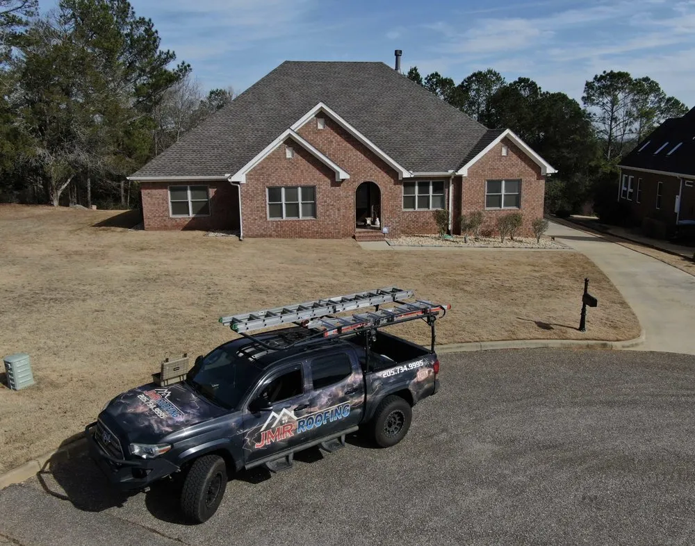 Slide of JMR Roofing