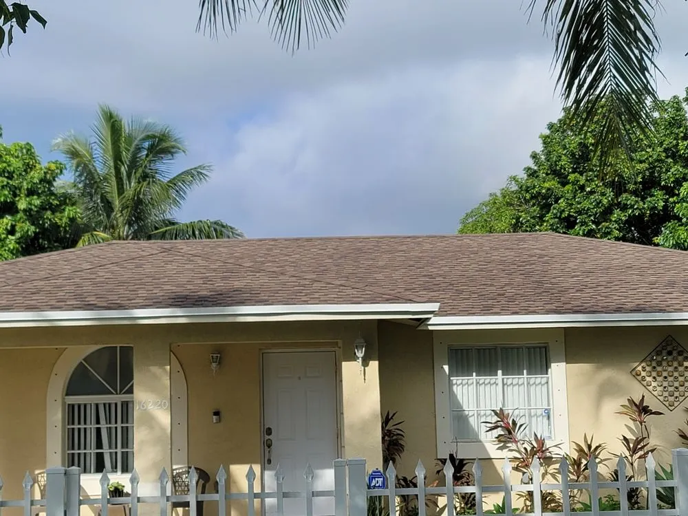 Slide of JMR Roofing Services