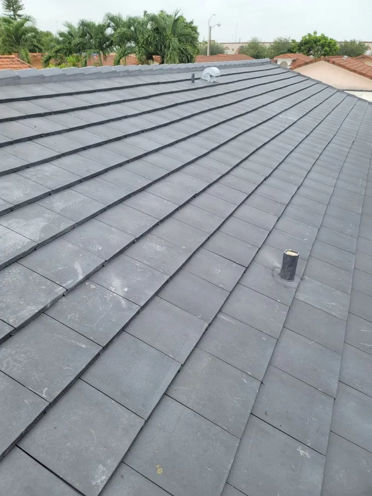 Slide of JMR Roofing Services