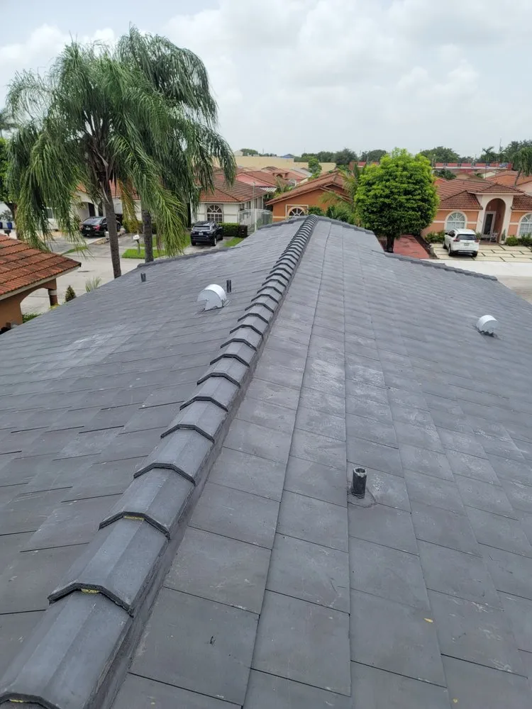 Slide of JMR Roofing Services