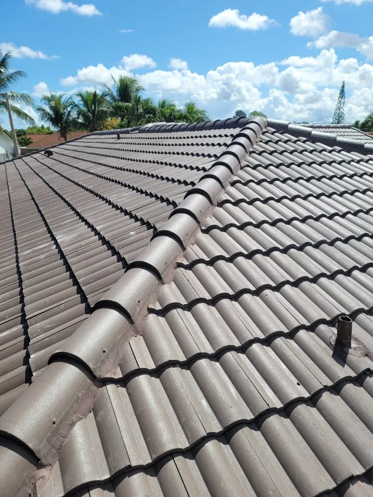 Slide of JMR Roofing Services