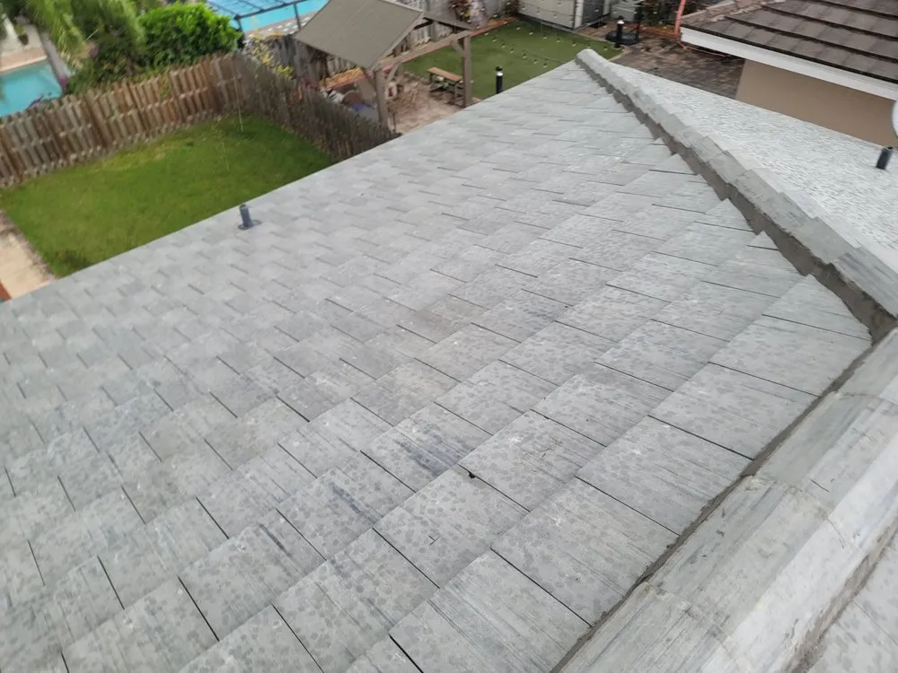 Slide of JMR Roofing Services