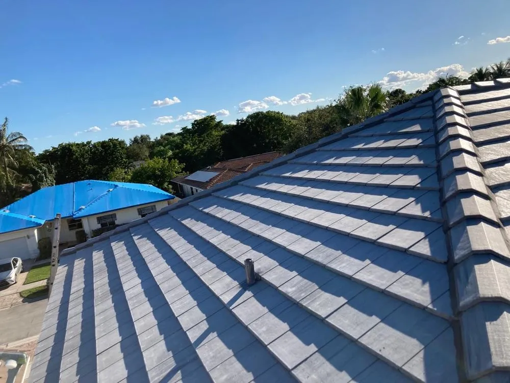 Slide of JMR Roofing Services