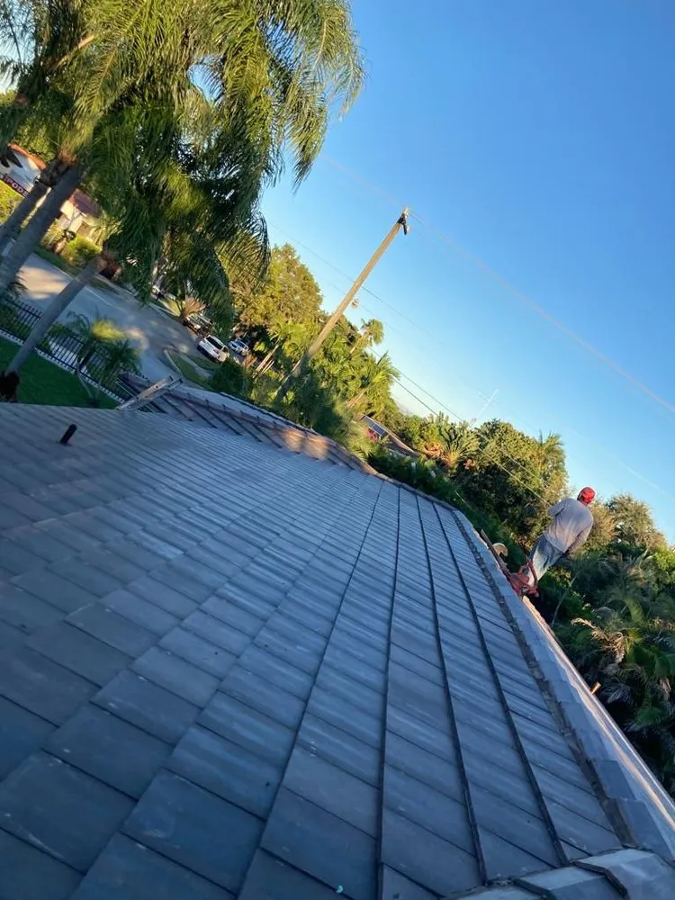 Slide of JMR Roofing Services