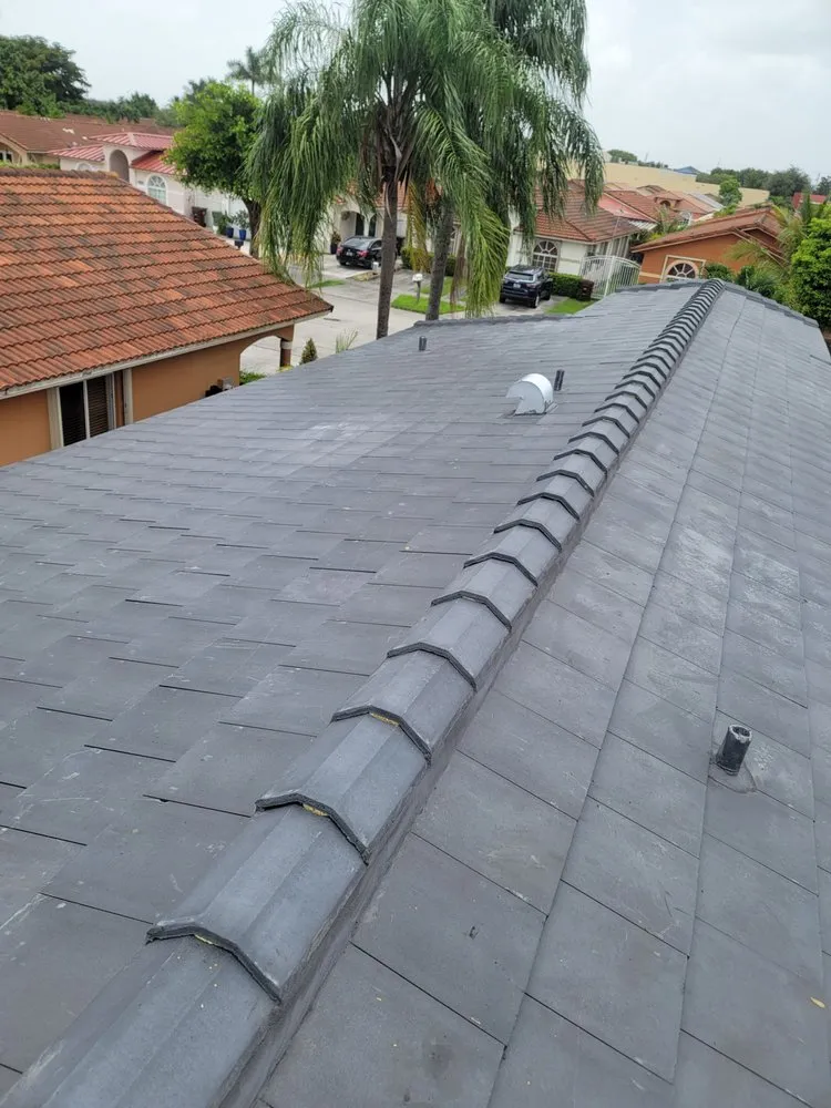 Slide of JMR Roofing Services