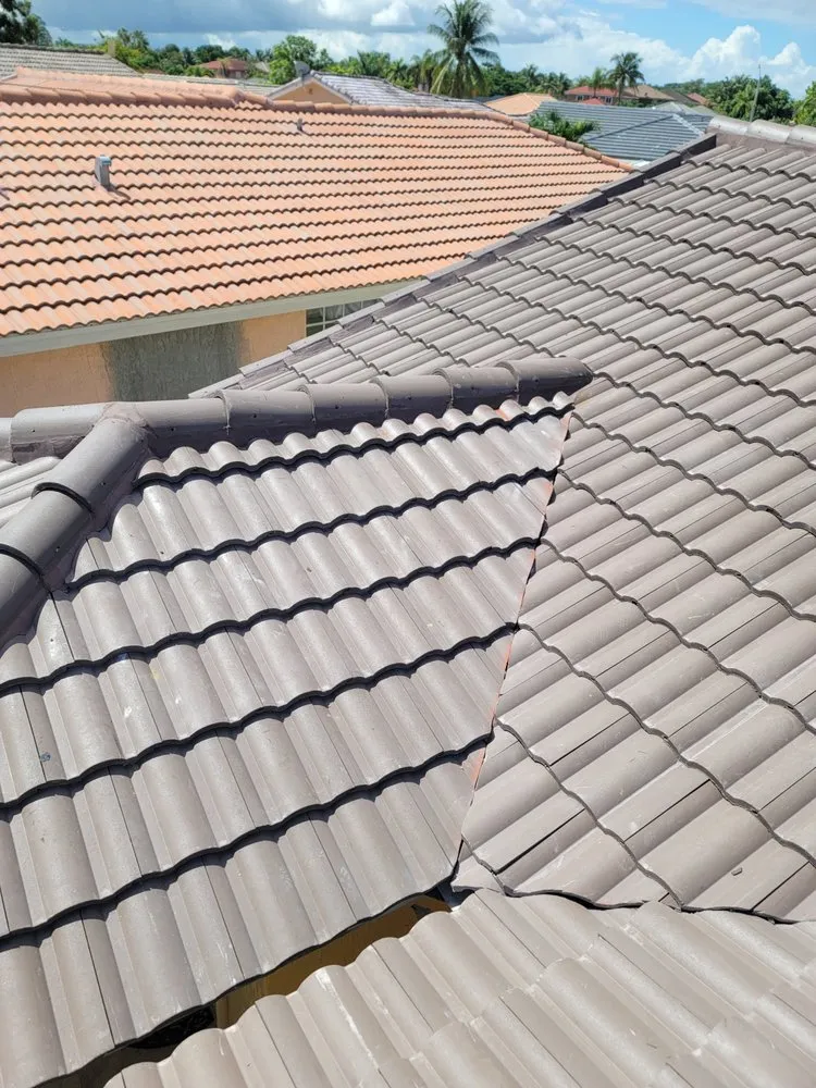 Slide of JMR Roofing Services