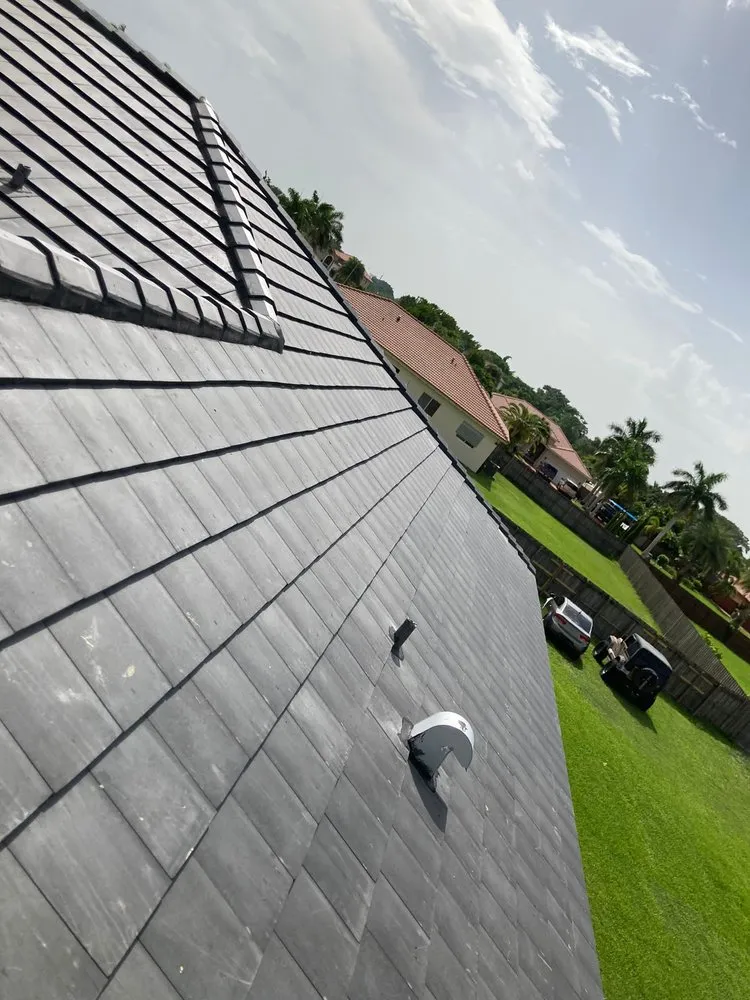 Slide of JMR Roofing Services