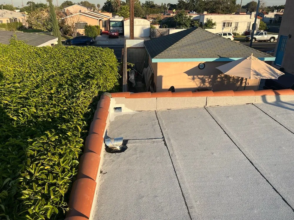 Emergency storm damage roof repair in Wilmington, CA by JMT Roofing