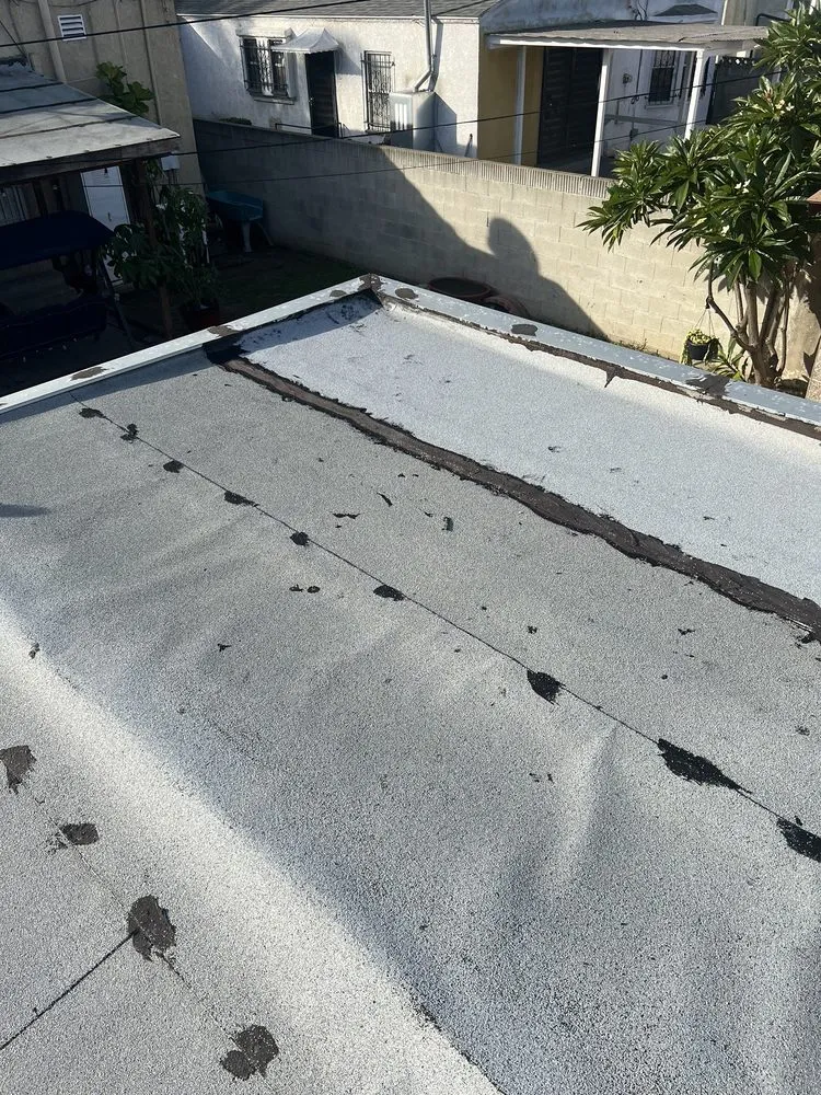 Licensed shingle roofing service in Wilmington, CA by JMT Roofing