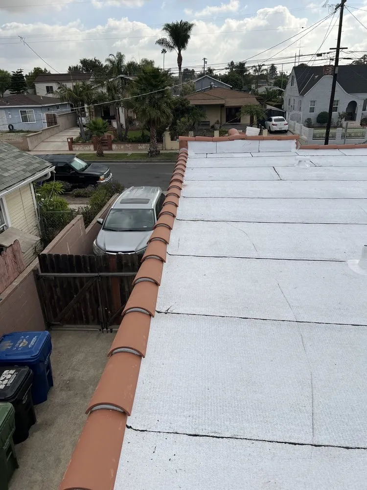 Emergency metal roofing installation in Wilmington, CA by JMT Roofing