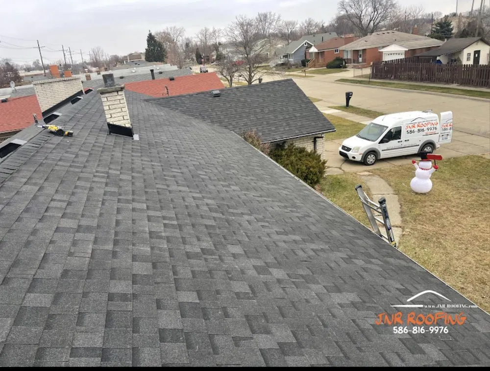 Slide of JNR Roofing