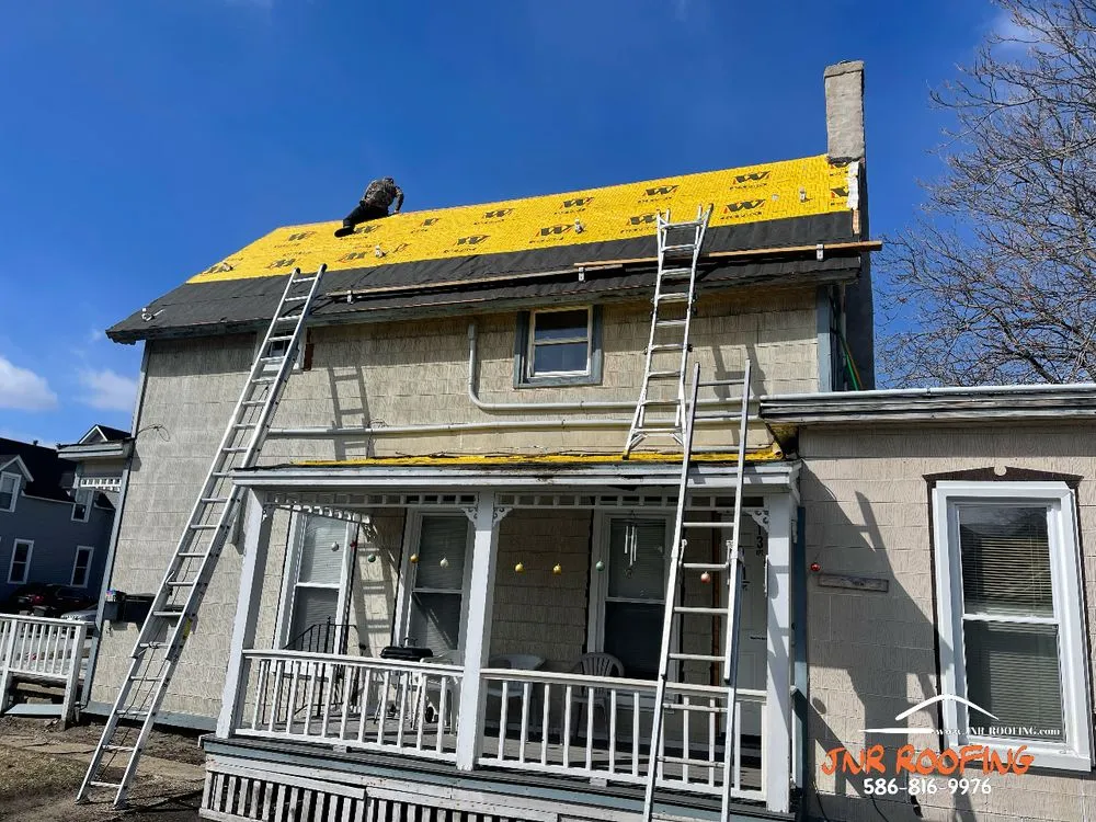 Slide of JNR Roofing