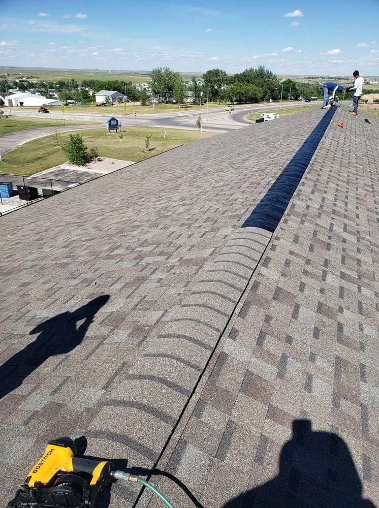 Slide of J&O roofing