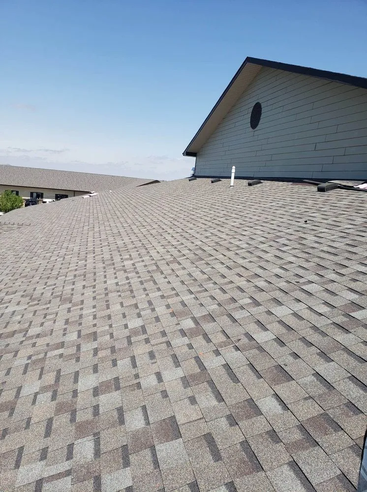 Slide of J&O roofing