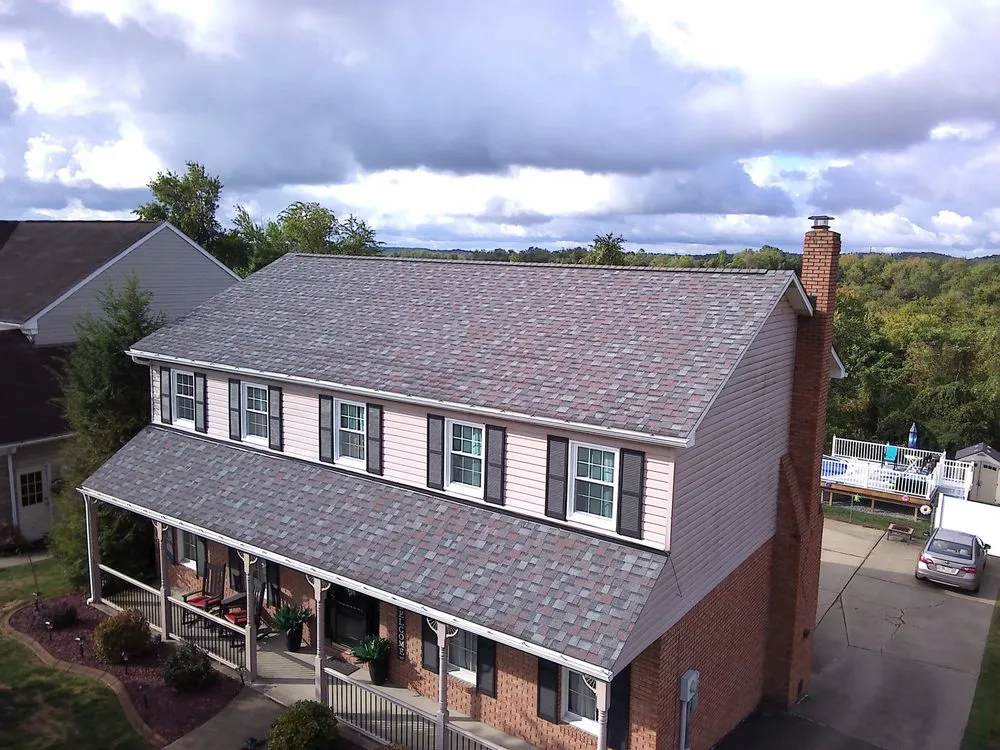 Slide of Joe Thornton Roofing