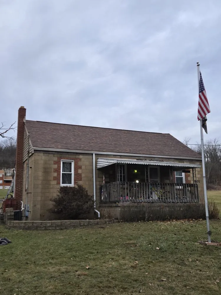 Slide of Joe Thornton Roofing