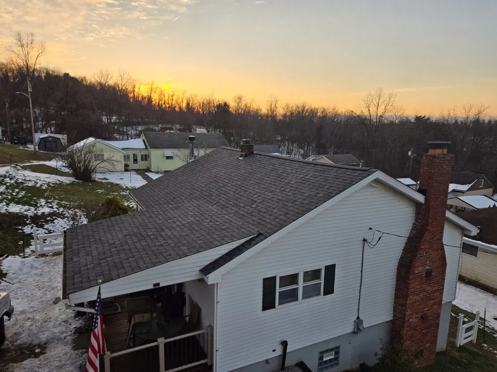 Slide of Joe Thornton Roofing