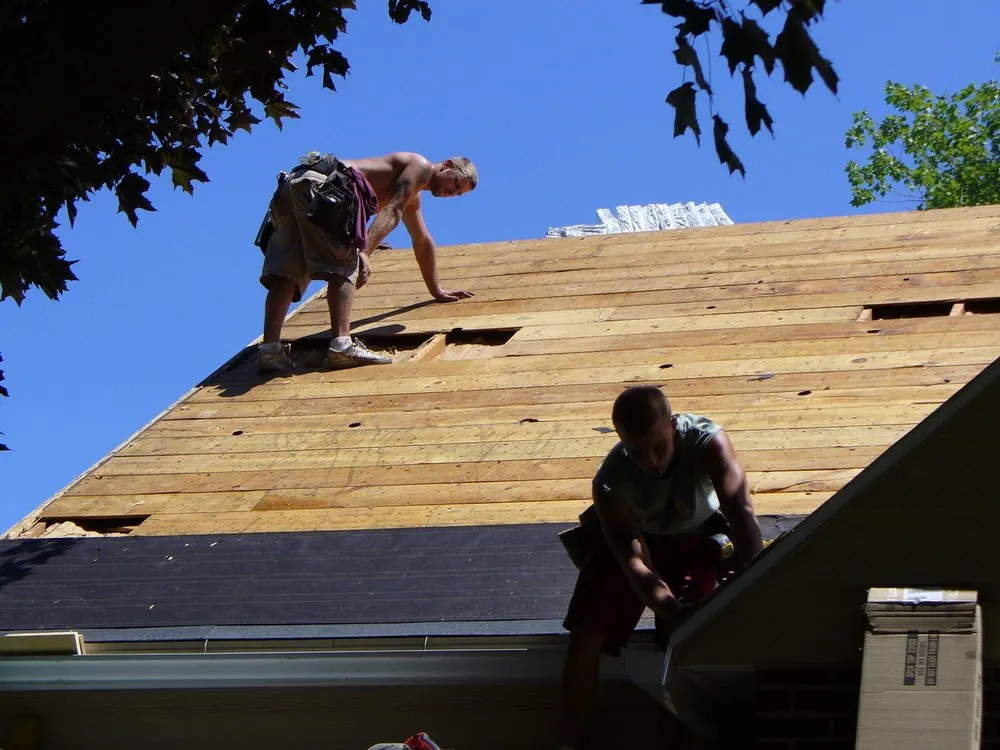 Slide of Joe Tlougan Roofing