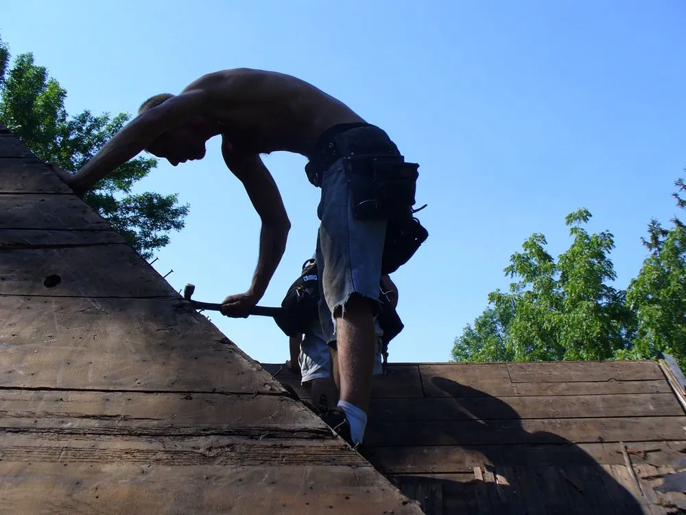 Slide of Joe Tlougan Roofing